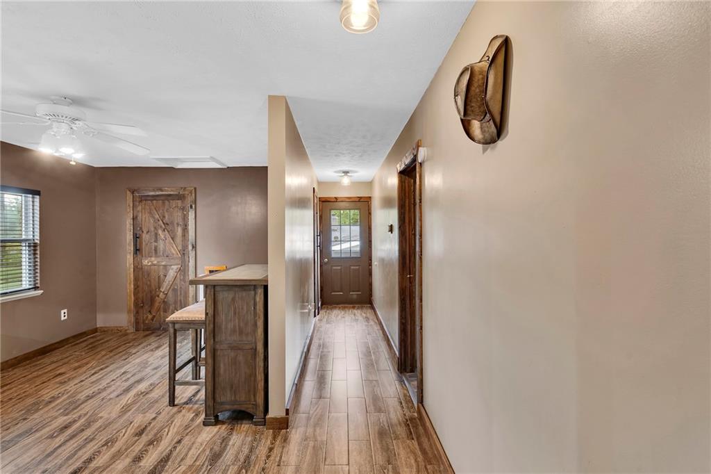 1233 Old Concord Road Monroeville, PA 15146 - Photo 10 of 40 a view of a hallway with wooden floor