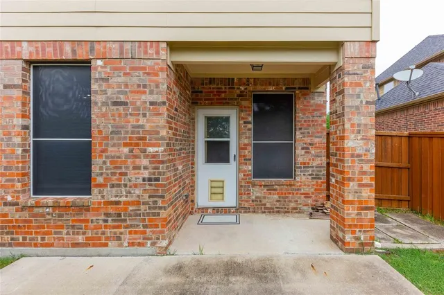 a front view of a building with a outdoor space
