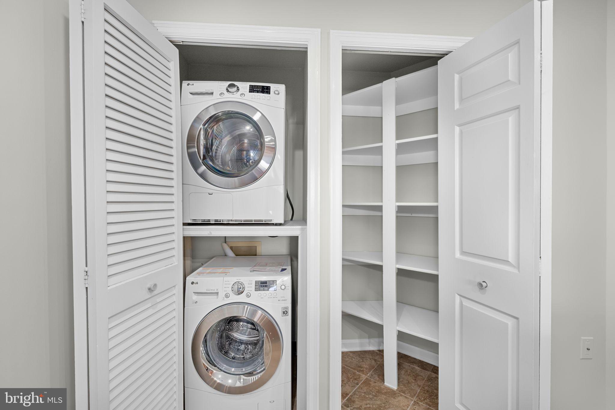 1301 North Courthouse Road, Unit 1805 Arlington, VA 22201 - Photo 12 of 40 a view of entryway with washer and dryer
