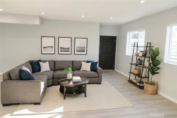 a living room with furniture and a couch