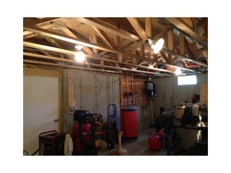 93 Mudgett Road Parsonsfield, ME 04047 - Photo 17 of 24 Basement. notice trusses, and the...