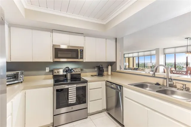 a bathroom with a sink a toilet a mirror and vanity