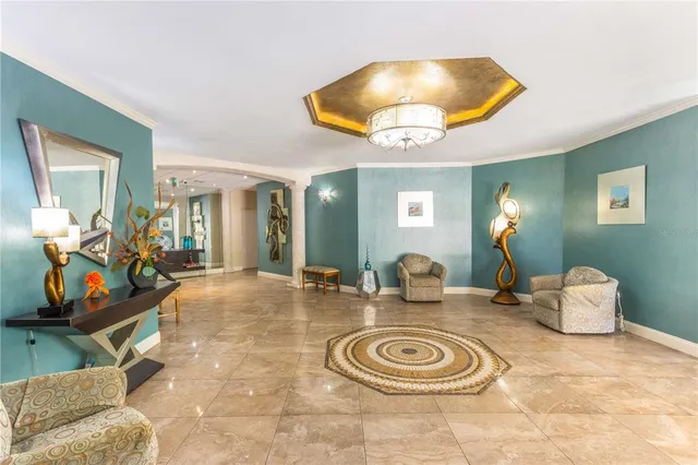 a view of a lake with lawn chairs