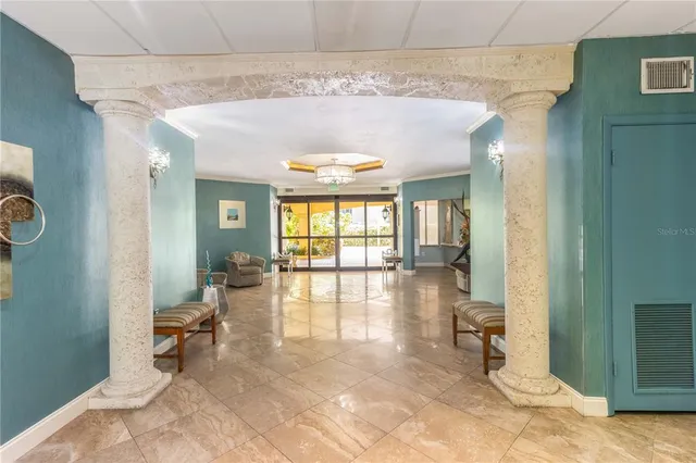 a view of a lake with tall buildings