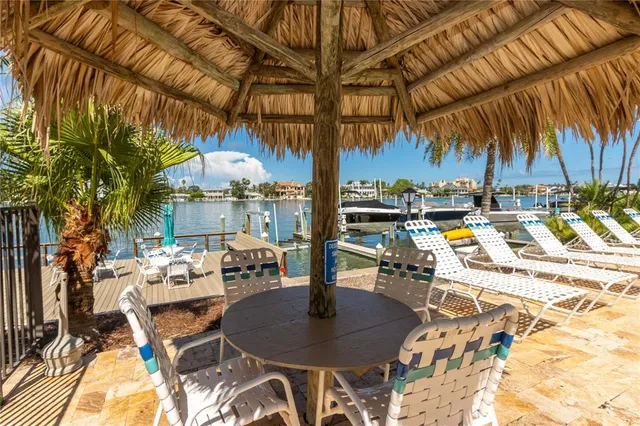 a front view of a building with a garden