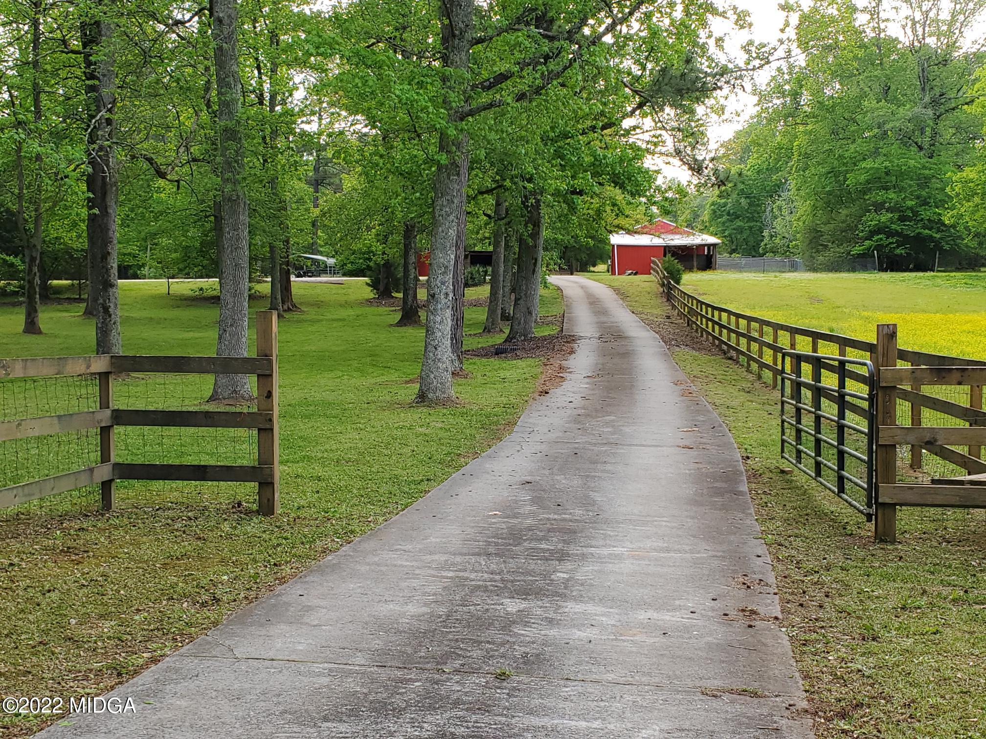 9934 Estes Road Macon, GA 31220 - Photo 26 of 26 a view of a park with large trees