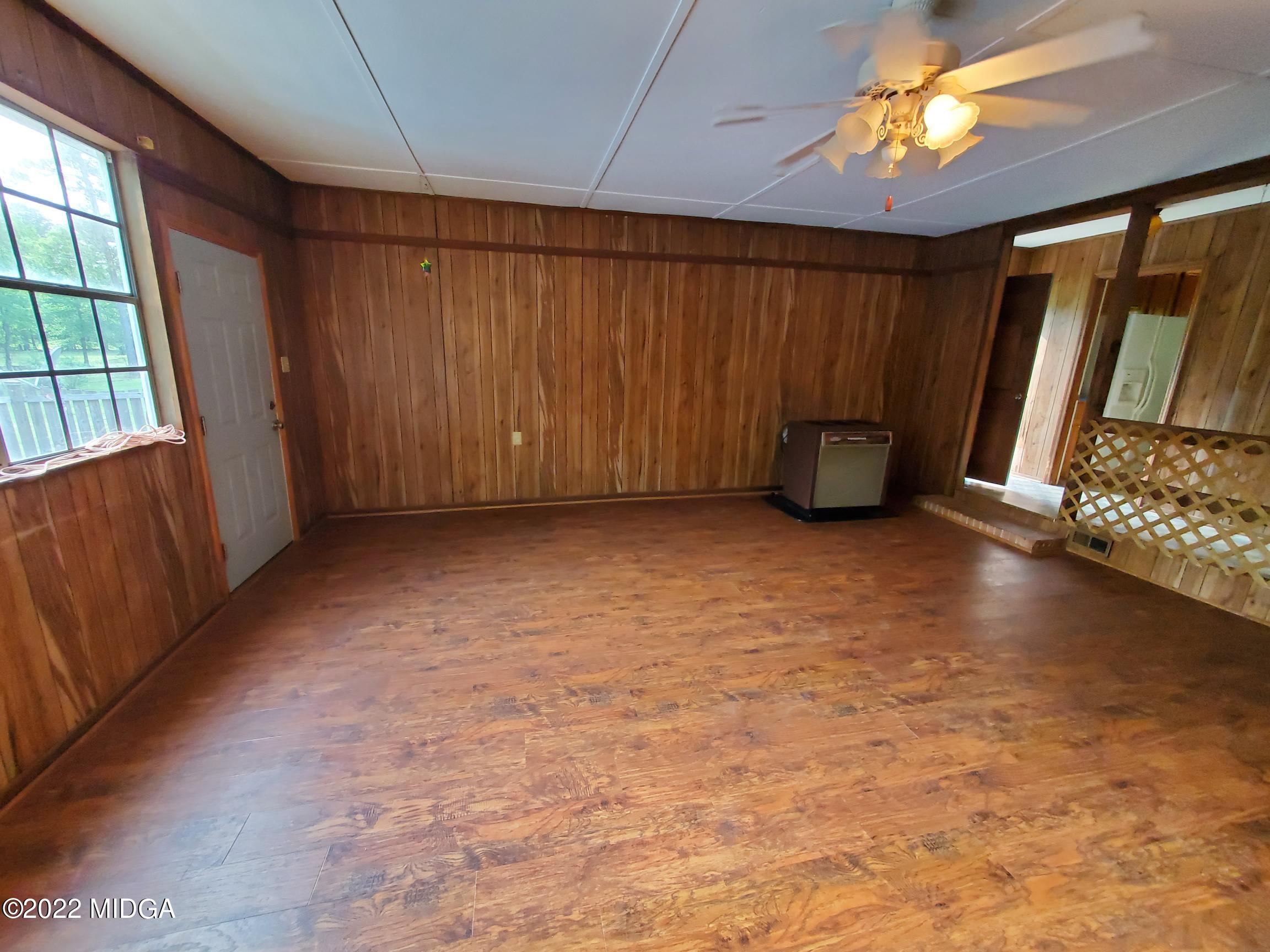 9934 Estes Road Macon, GA 31220 - Photo 3 of 26 an empty room with windows