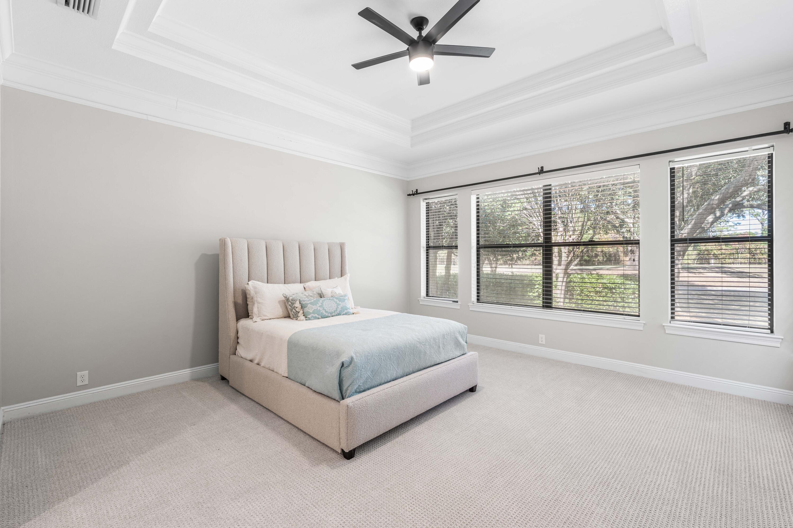 4345 Carriage Lane Destin, FL 32541 - Photo 21 of 39 a large white bed sitting in a room next to a window
