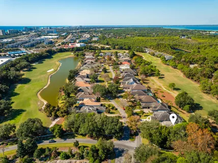 an aerial view of ocean residential houses with outdoor space