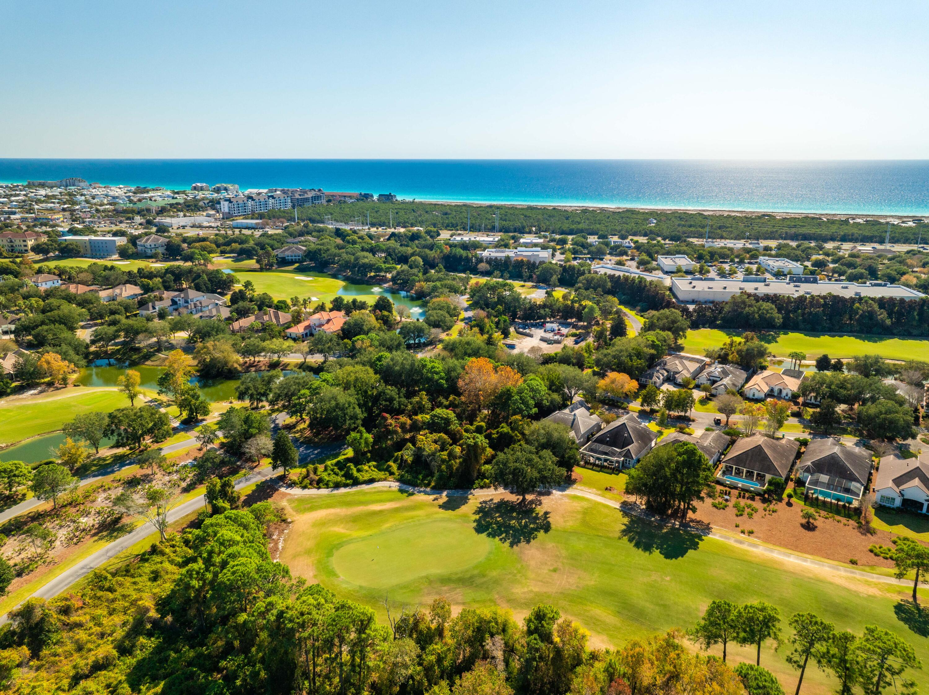 4345 Carriage Lane Destin, FL 32541 - Photo 38 of 39 an aerial view of residential houses with outdoor space and trees
