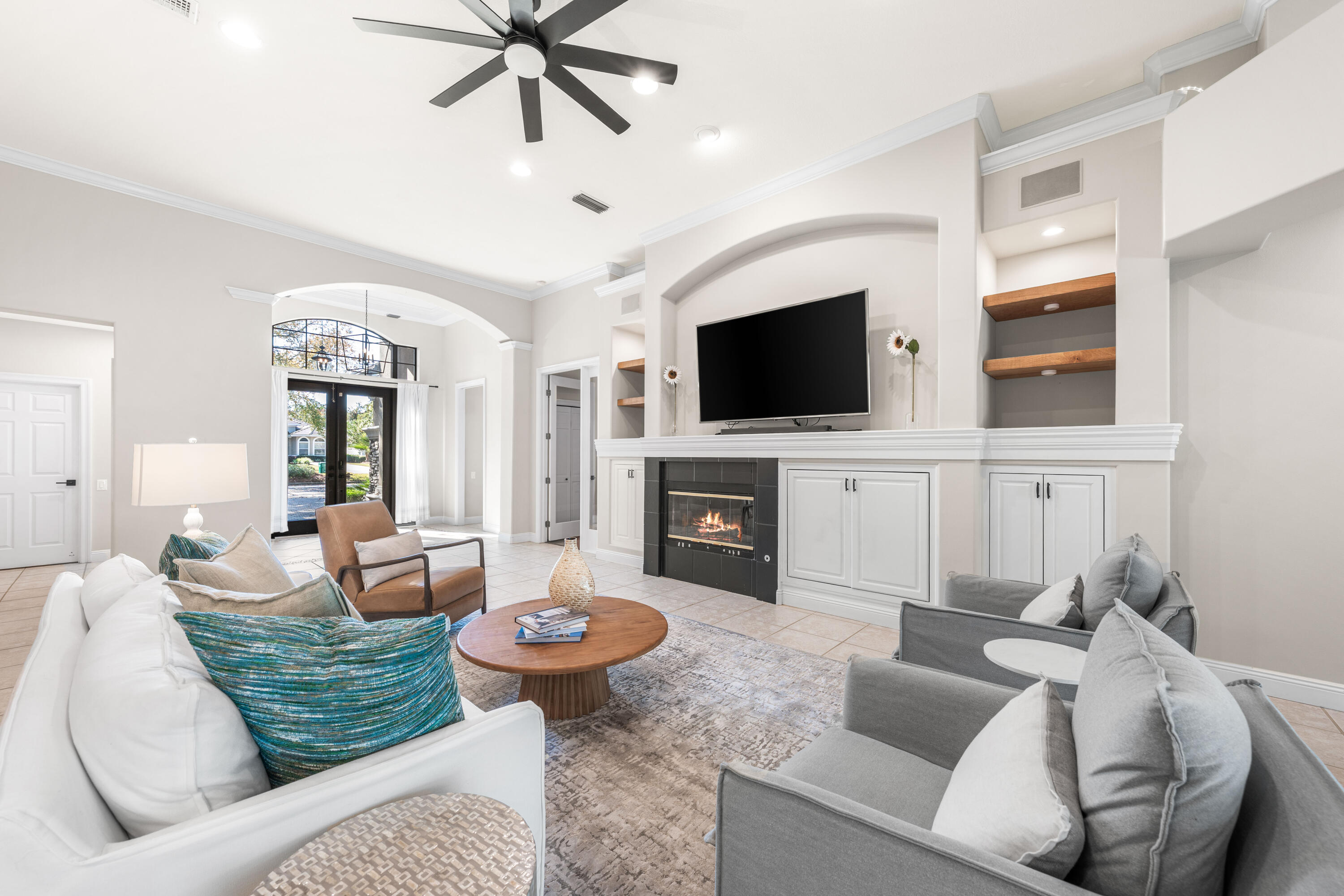 4345 Carriage Lane Destin, FL 32541 - Photo 9 of 39 a living room with furniture and a flat screen tv