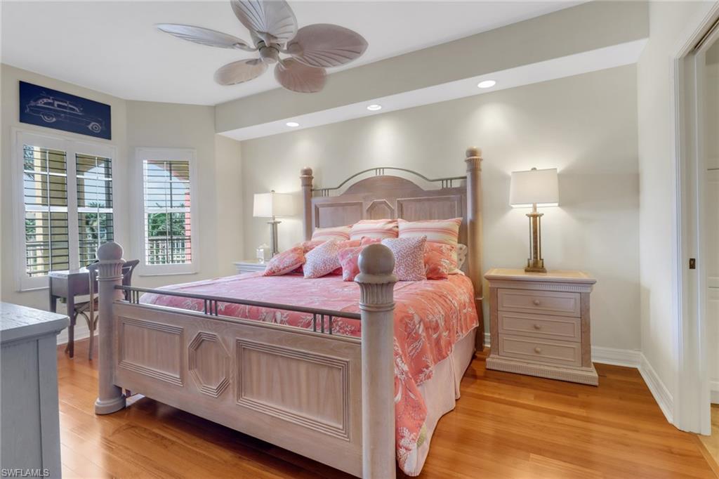 410 Bayfront Place, Unit 2303 Naples, FL 34102 - Photo 15 of 31 a bed room with a bed and a window
