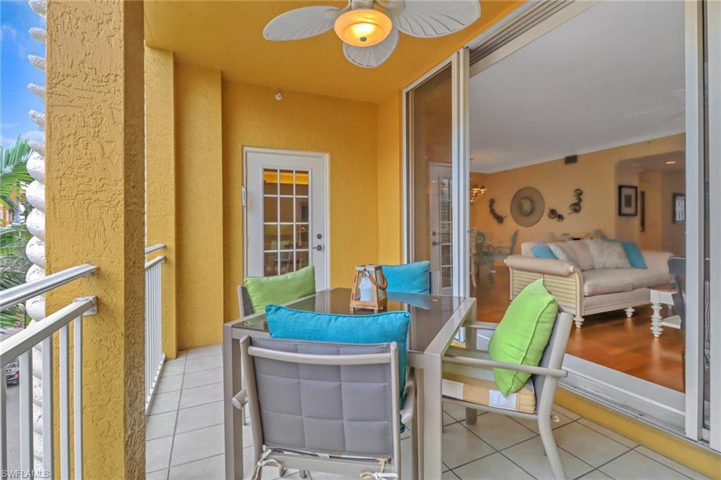 410 Bayfront Place, Unit 2303 Naples, FL 34102 - Photo 22 of 31 a view of a dining room with furniture and a window