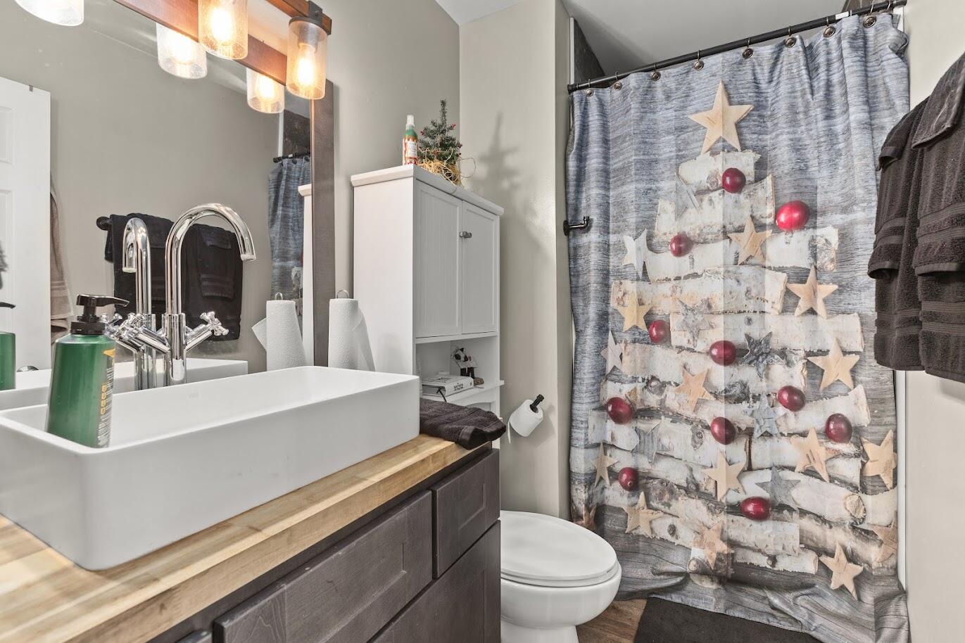 5000 Spinnaker Lane Crown Point, IN 46307 - Photo 14 of 23 a bathroom with a sink toilet and shower