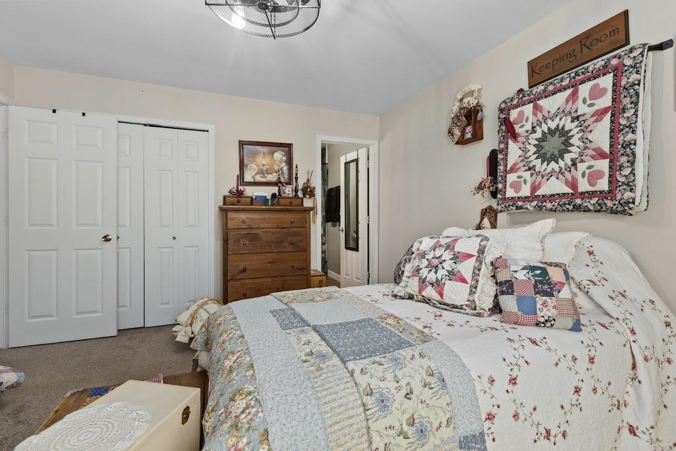 5000 Spinnaker Lane Crown Point, IN 46307 - Photo 15 of 23 a bedroom with a bed and a dresser