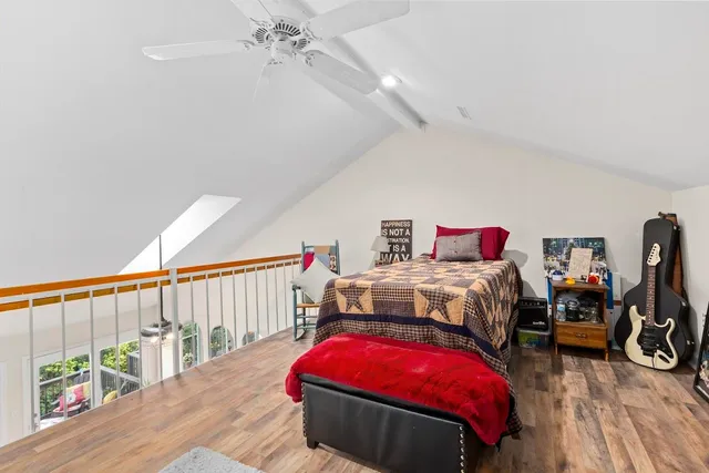 a view of a chairs and table in the balcony