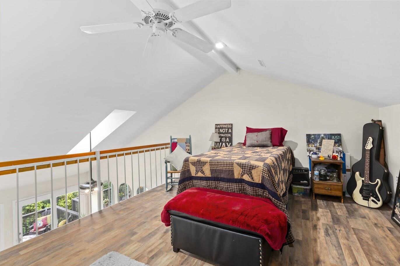 5000 Spinnaker Lane Crown Point, IN 46307 - Photo 18 of 23 a bedroom with a bed and a wooden floor