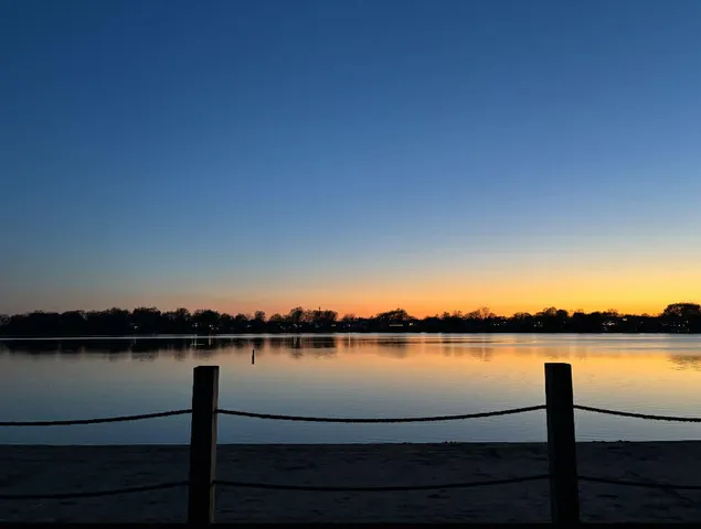 a view of a lake from a balcony
