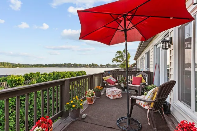 a view of a lake from a balcony