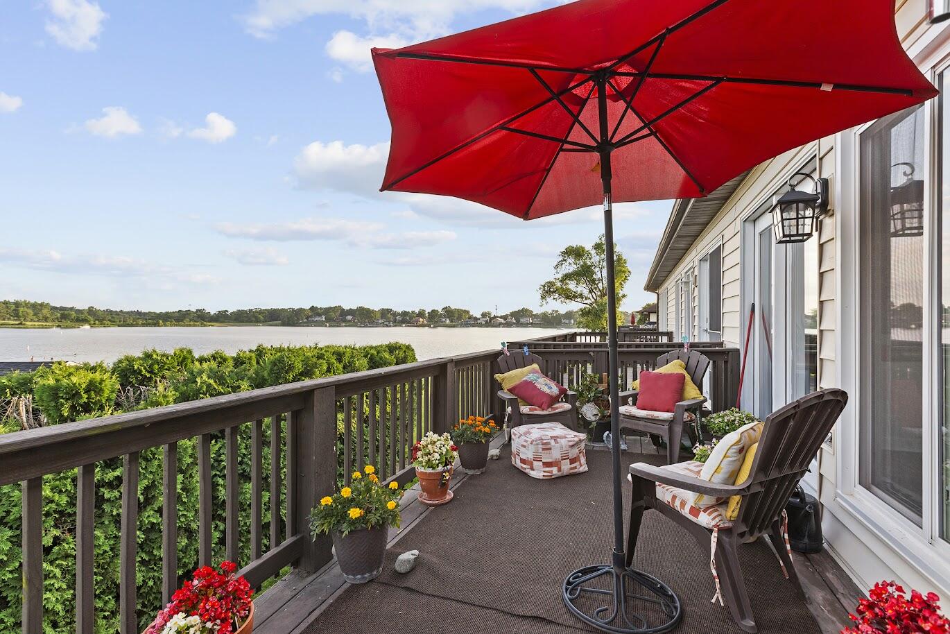 5000 Spinnaker Lane Crown Point, IN 46307 - Photo 20 of 23 a view of a chairs and table in the balcony