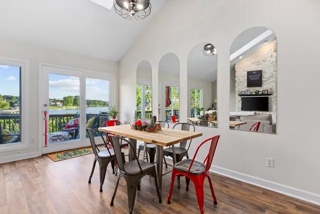 a kitchen with stainless steel appliances a stove sink microwave and cabinets