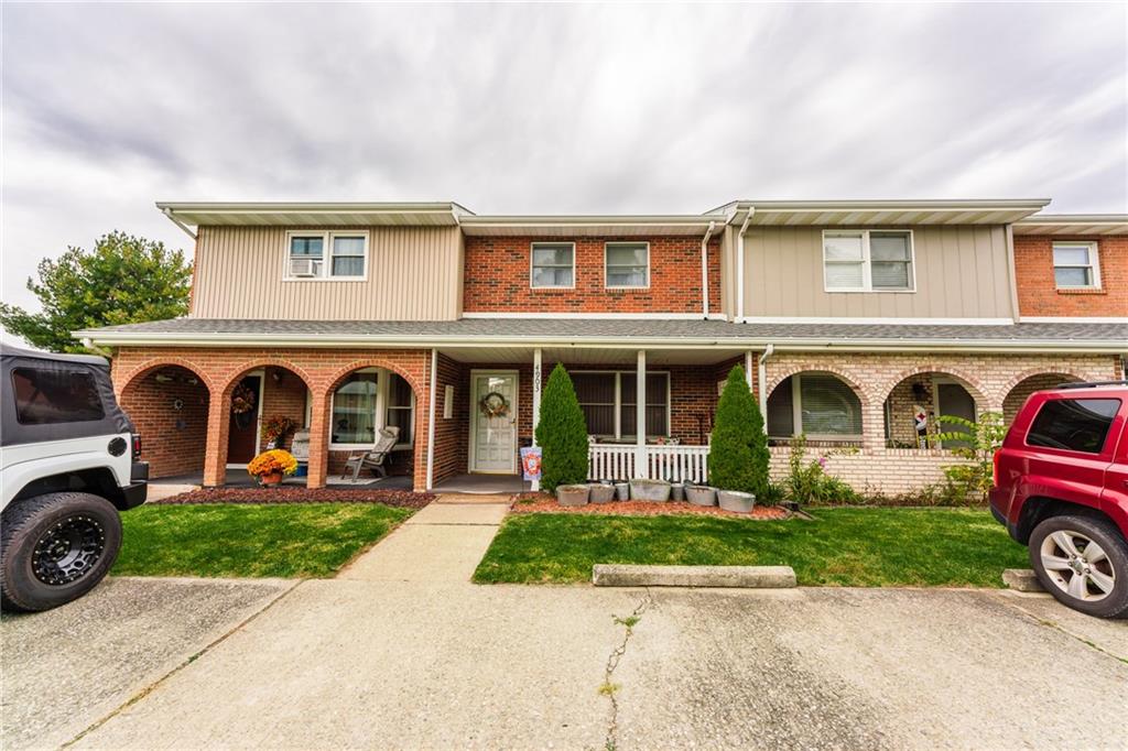4903 Lucerne Road Indiana, PA 15701 - Photo 2 of 16 a front view of a house with garden