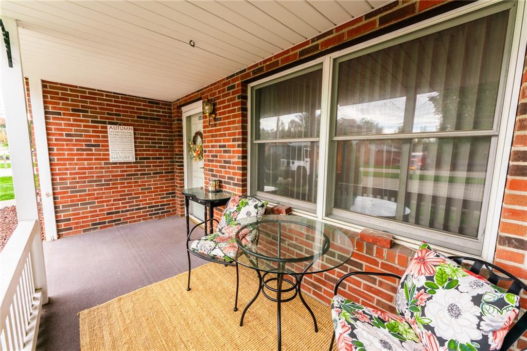 4903 Lucerne Road Indiana, PA 15701 - Photo 3 of 16 a balcony with chairs and table in patio