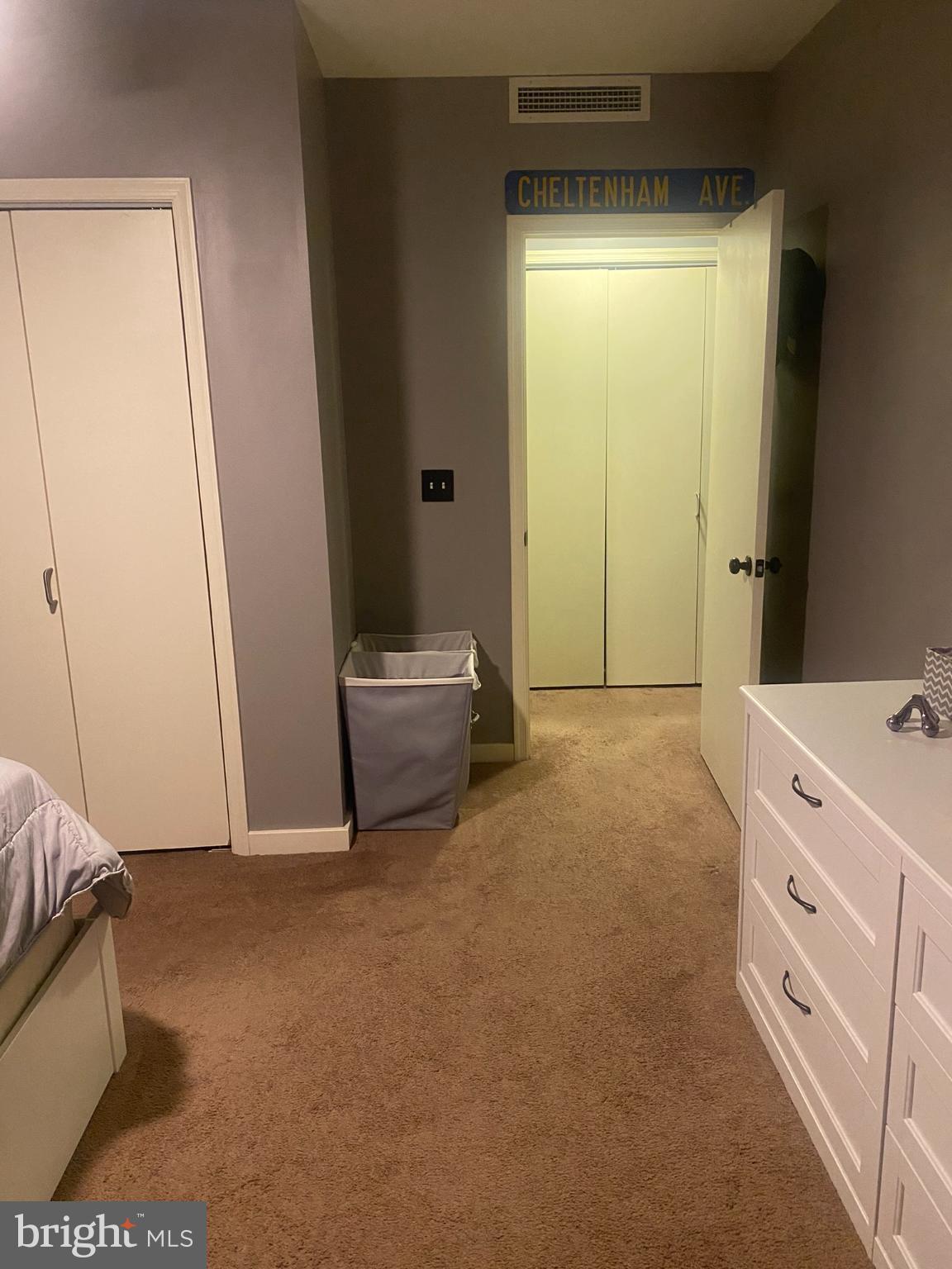 1600 Church Road, Unit B213 Wyncote, PA 19095 - Photo 16 of 25 a view of a bedroom with cabinet and mirror