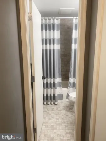 a bathroom with a sink and toilet