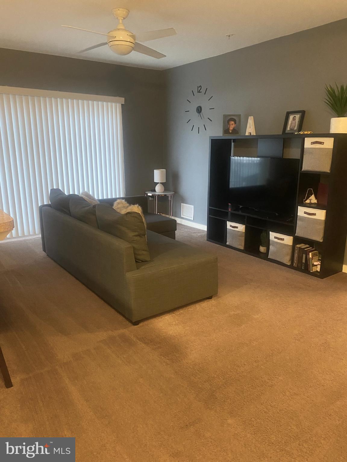 1600 Church Road, Unit B213 Wyncote, PA 19095 - Photo 8 of 25 a living room with furniture and a flat screen tv