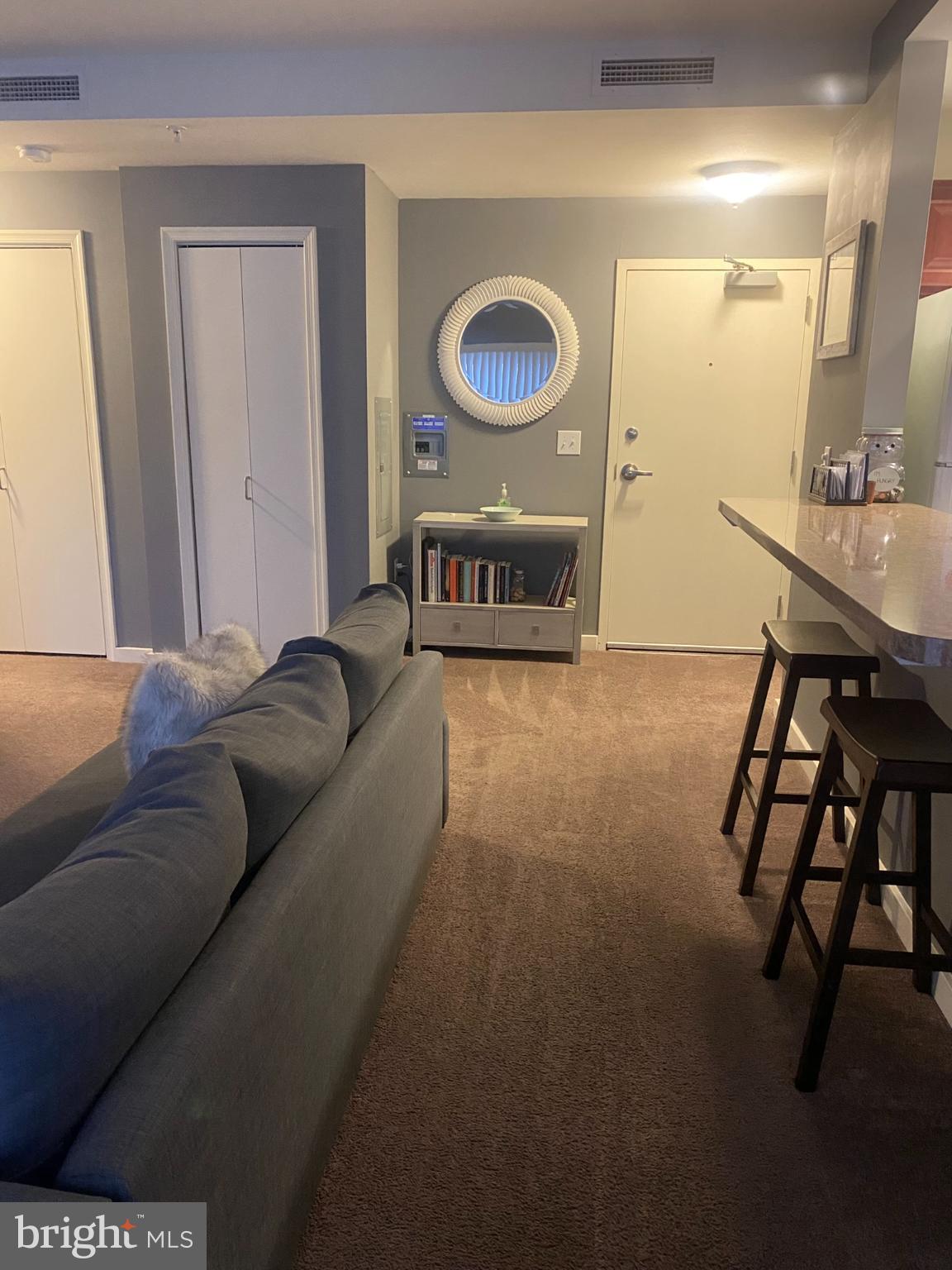 1600 Church Road, Unit B213 Wyncote, PA 19095 - Photo 9 of 25 a living room with a couch and a table