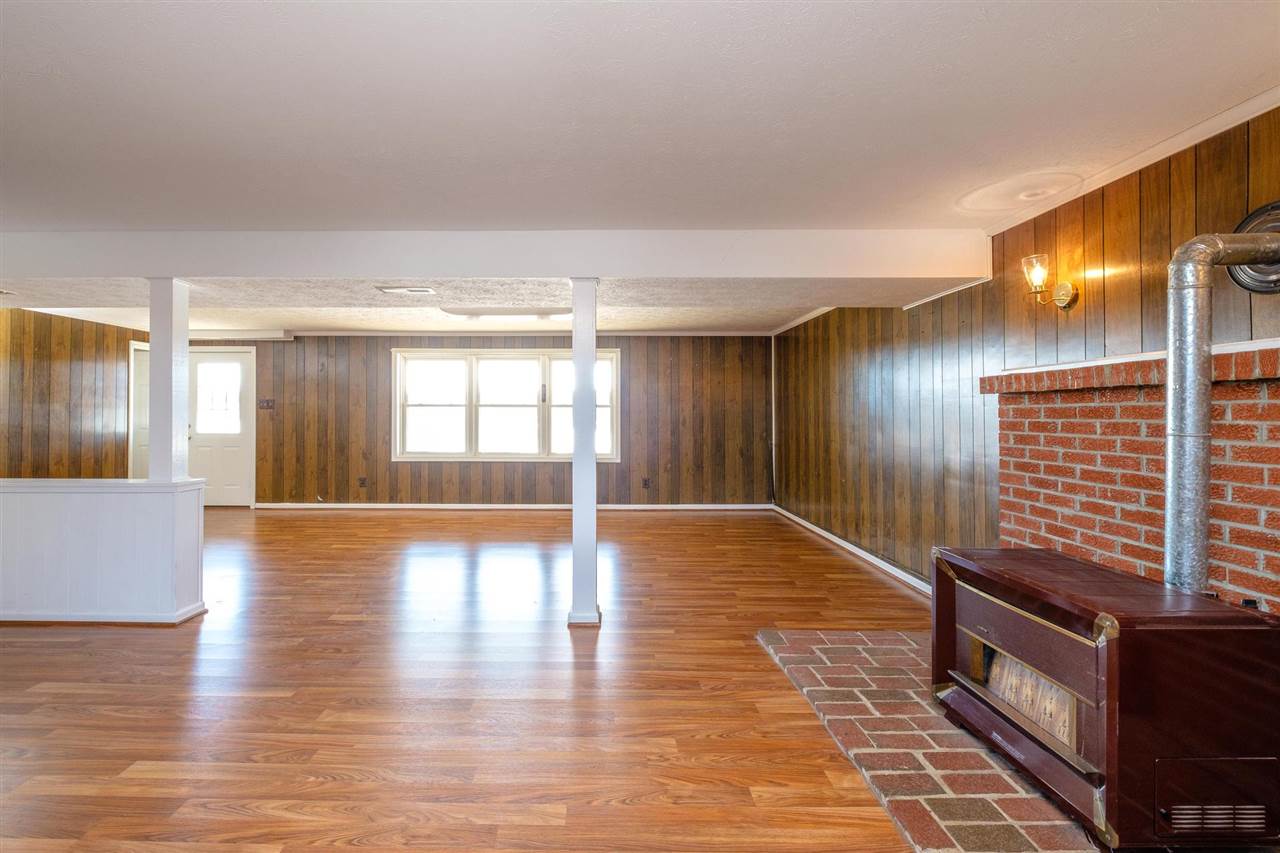 490 Augusta Farms Road Waynesboro, VA 22980 - Photo 23 of 49 a view of empty room with wooden floor and fan