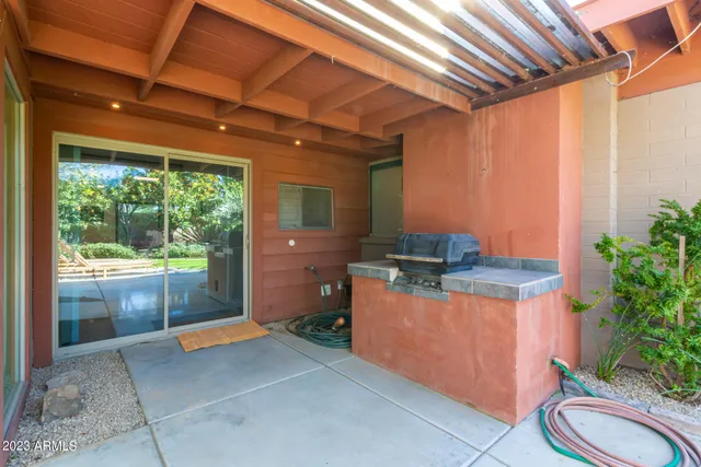 a outdoor living space with furniture and garden view
