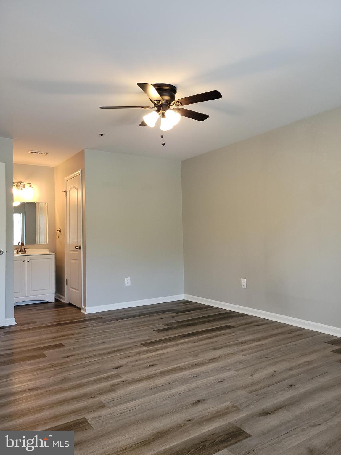 8360 Montgomery Run Road, Unit H Ellicott City, MD 21043 - Photo 22 of 28 Primary Bedroom to Walk-in Closet
