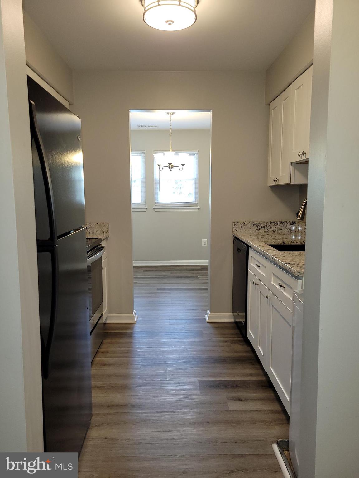 8360 Montgomery Run Road, Unit H Ellicott City, MD 21043 - Photo 3 of 28 Kitchen from Foyer