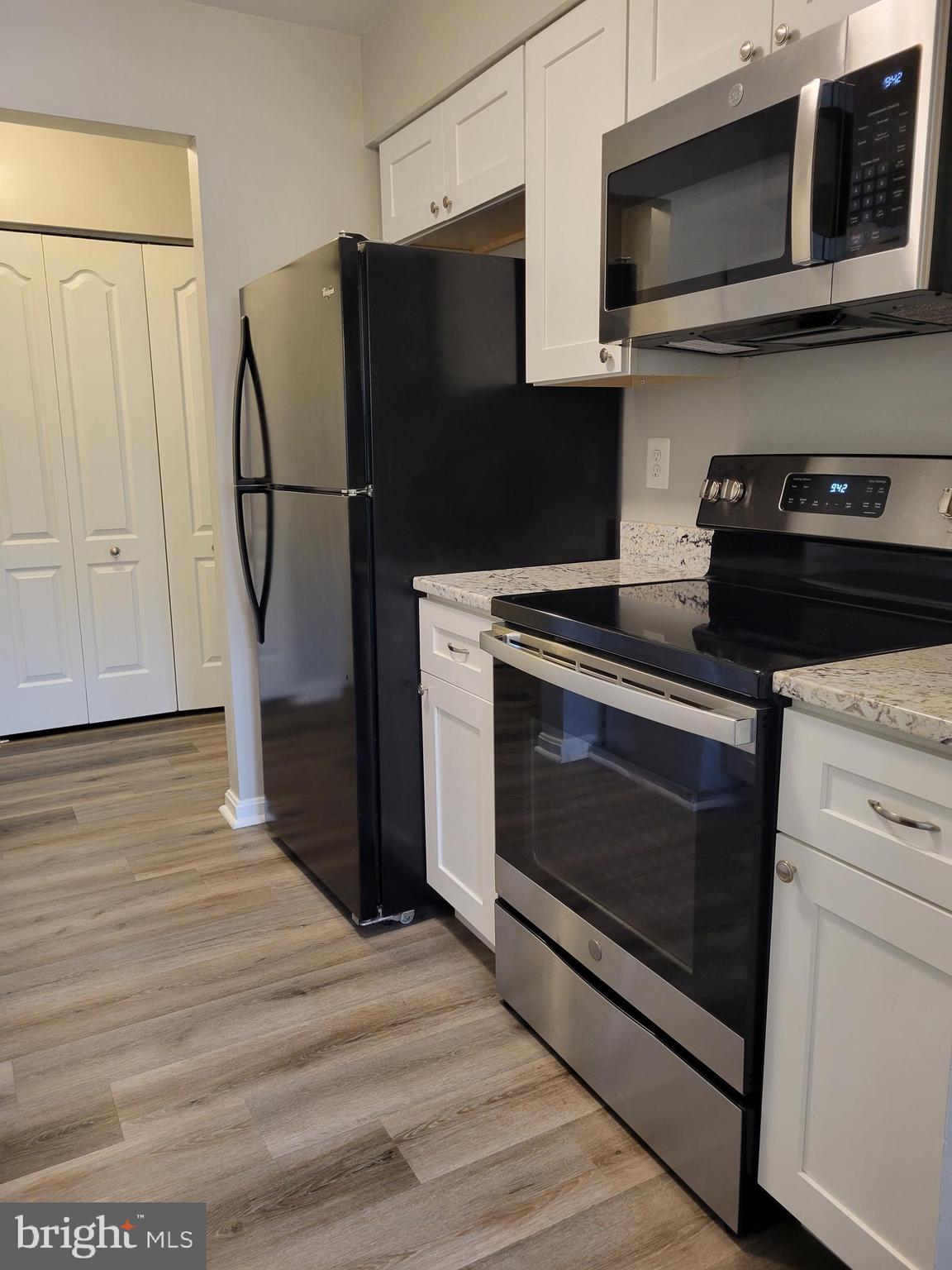8360 Montgomery Run Road, Unit H Ellicott City, MD 21043 - Photo 4 of 28 Kitchen from Dining Room