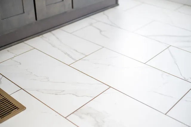 a view of a hallway with entryway wooden floor and a dining room