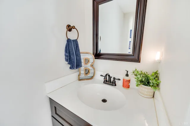 a close view of a sink a faucet and a tap