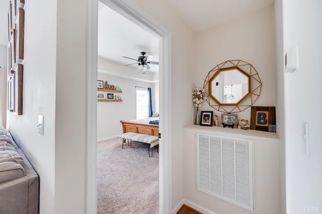 a view of livingroom with hardwood floor and a ceiling fan