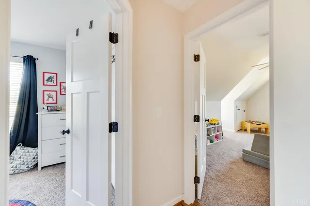 a view of a swimming pool with a yard and mountain view