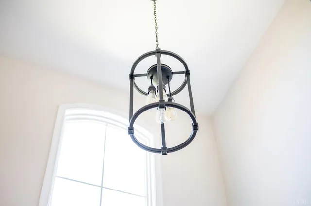 a living room with fireplace furniture and a flat screen tv