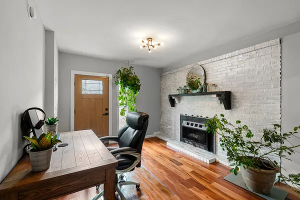 a view of a workspace with furniture