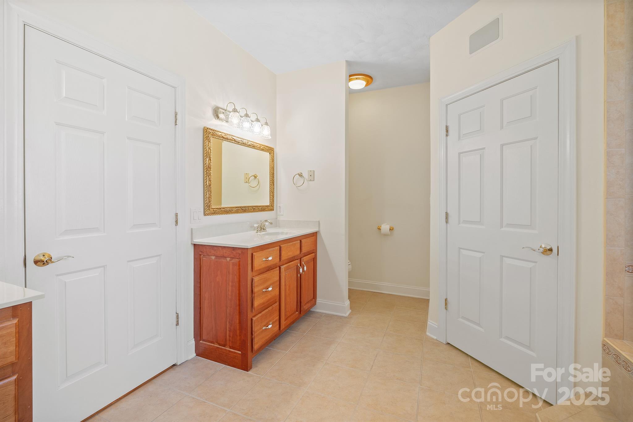 5350 Beacon Ridge Drive Granite Falls, NC 28630 - Photo 19 of 48 a view of room with sink and mirror