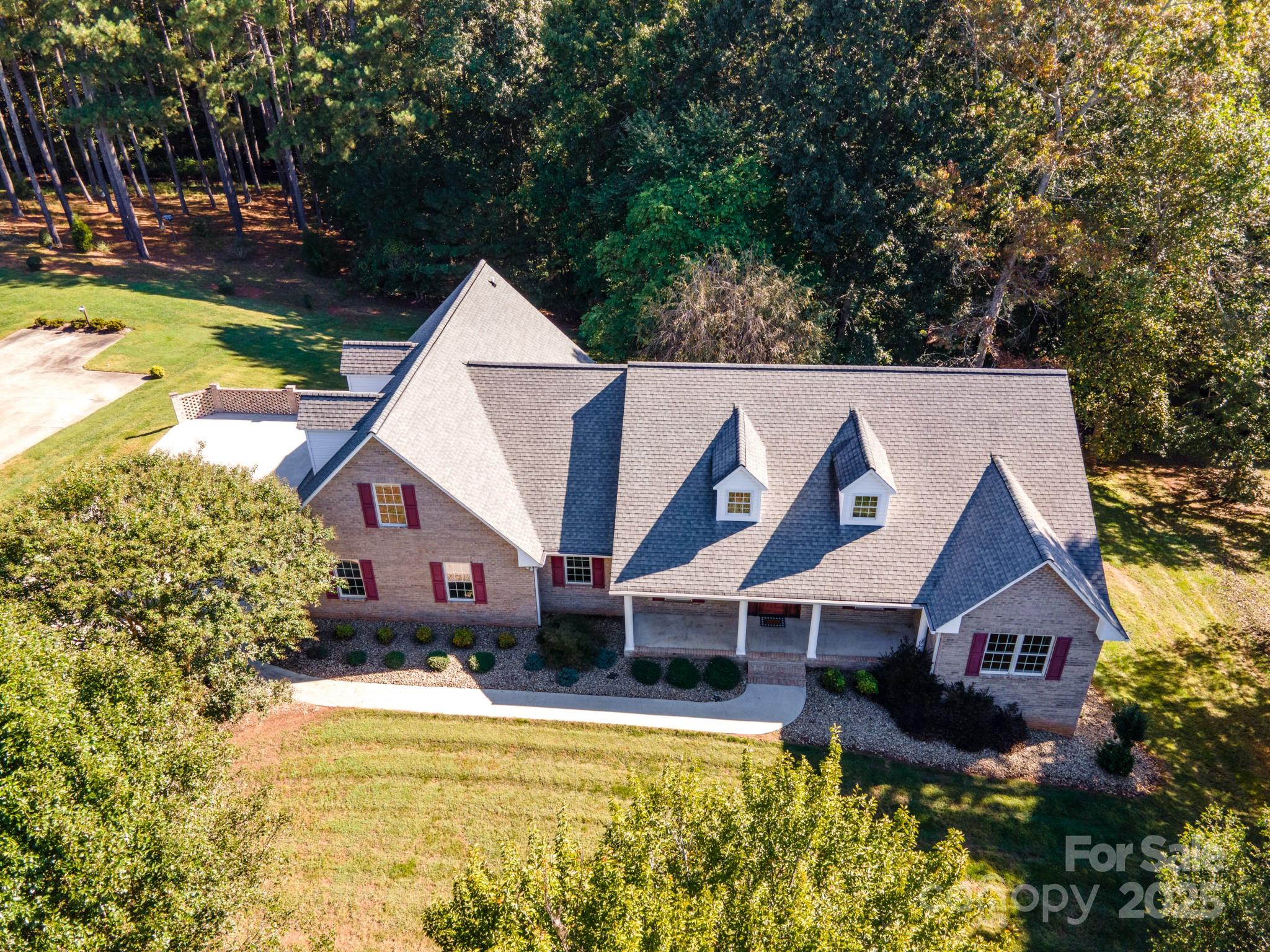 5350 Beacon Ridge Drive Granite Falls, NC 28630 - Photo 4 of 48 a aerial view of a house with swimming pool