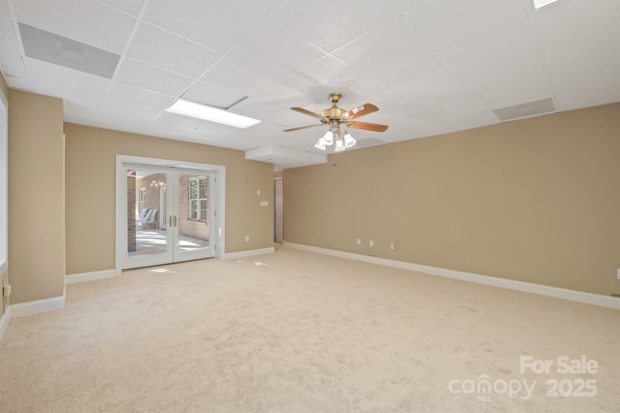 5350 Beacon Ridge Drive Granite Falls, NC 28630 - Photo 41 of 48 a view of an empty room with a chandelier fan