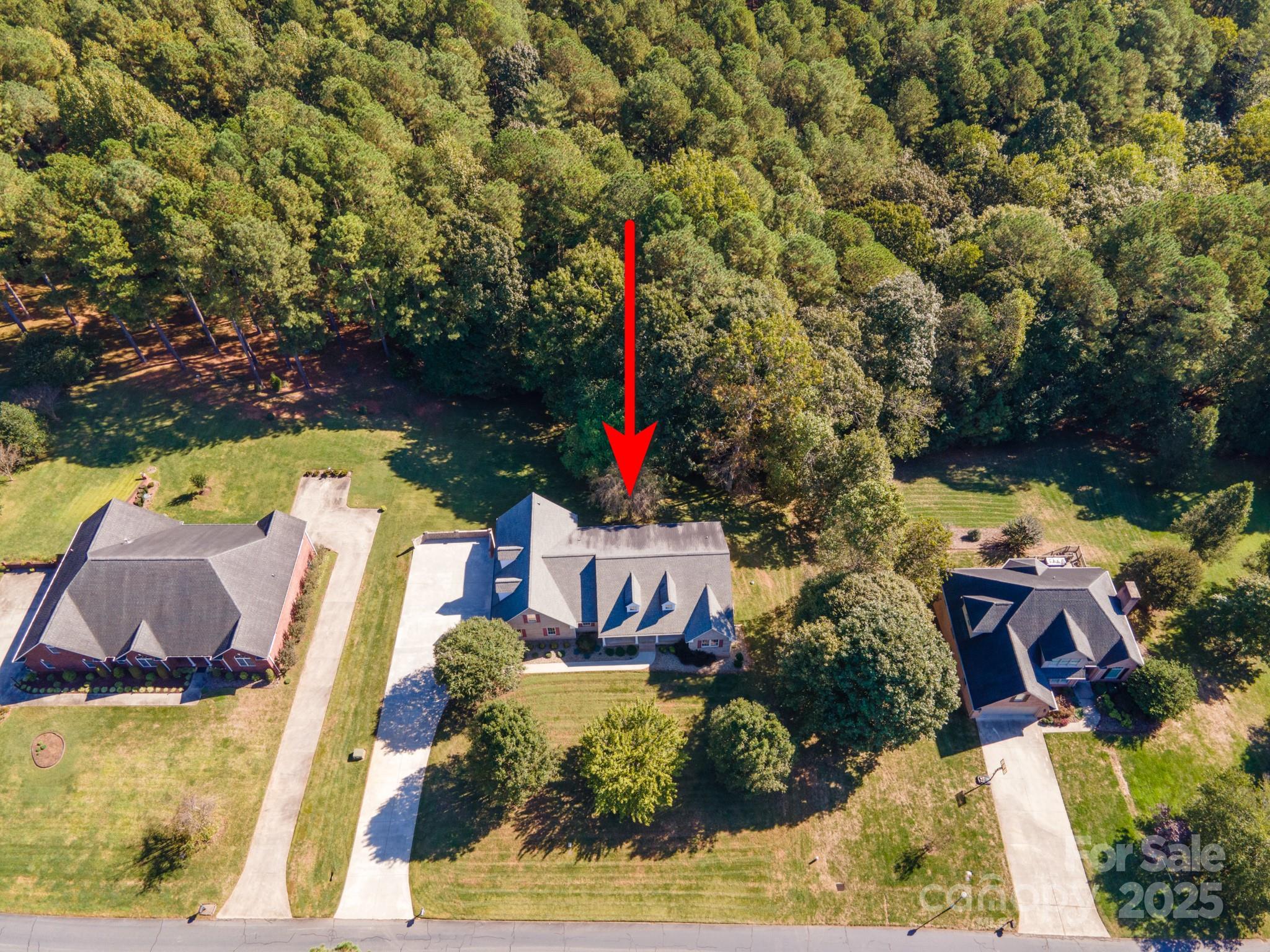 5350 Beacon Ridge Drive Granite Falls, NC 28630 - Photo 46 of 48 a aerial view of a house with swimming pool and red chairs