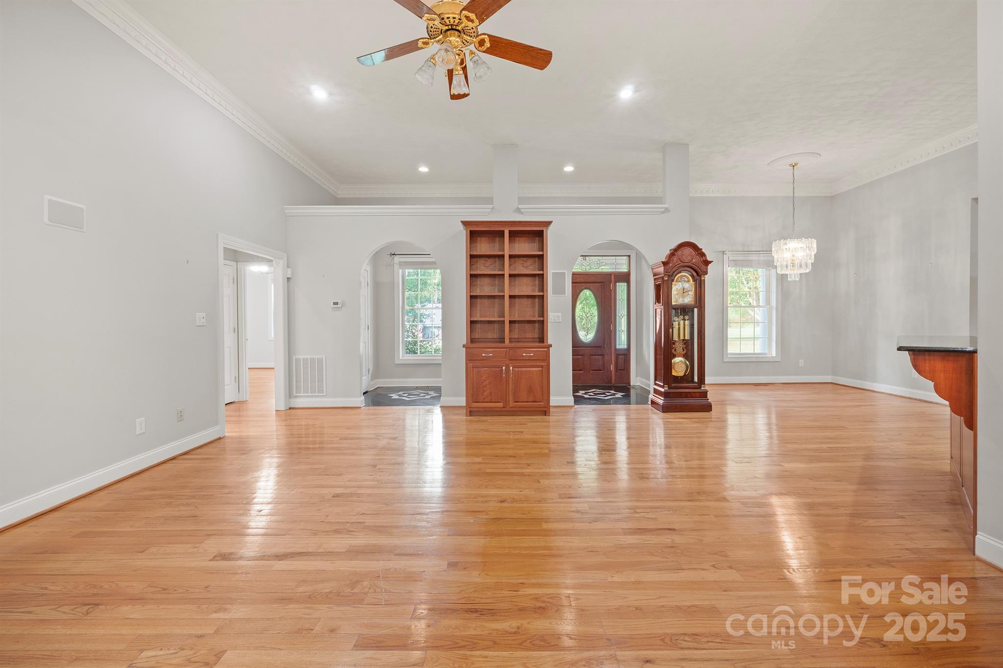 5350 Beacon Ridge Drive Granite Falls, NC 28630 - Photo 9 of 48 an empty room with wooden floor and natural light