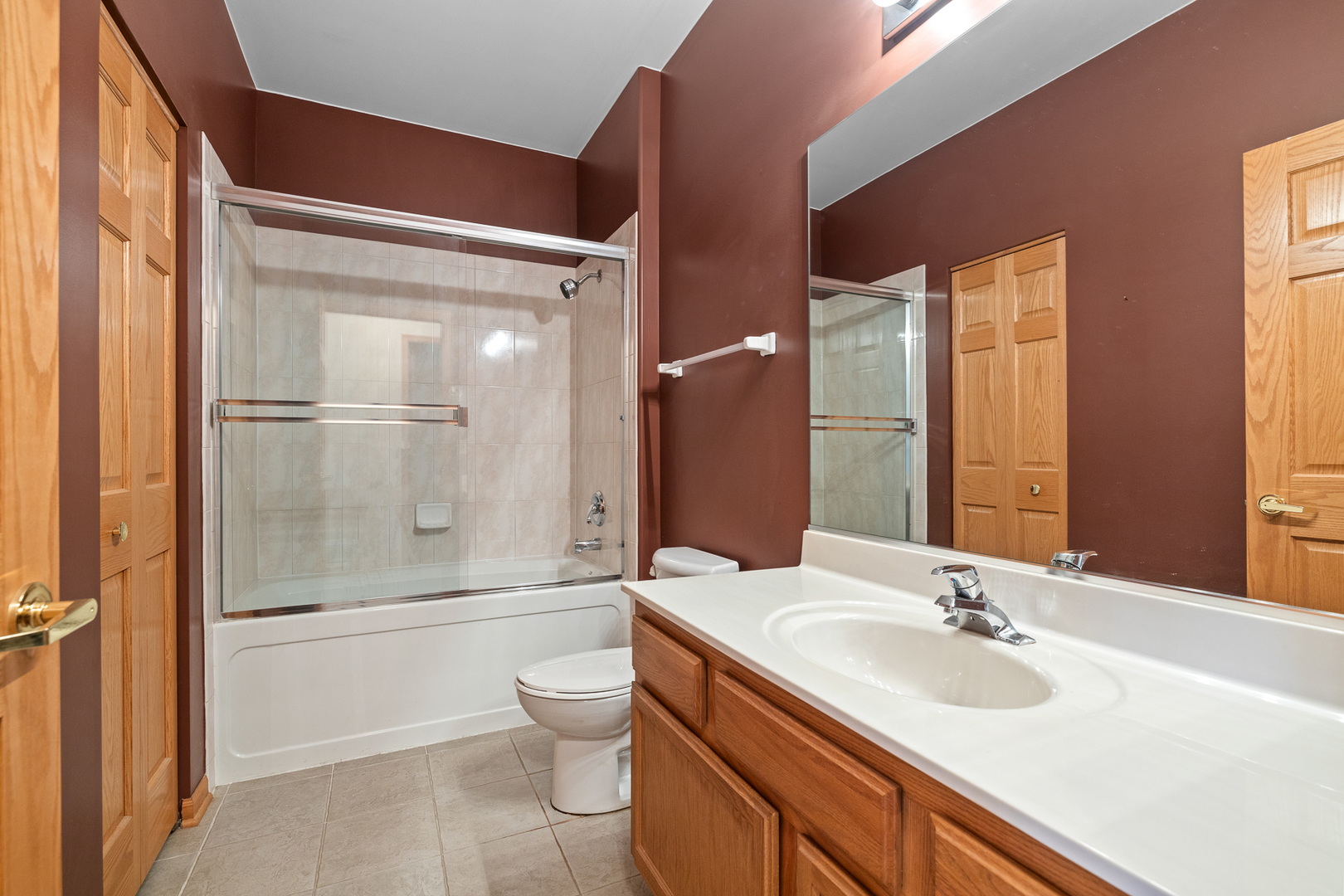 631 Saugatuk Circle Romeoville, IL 60446 - Photo 15 of 22 a bathroom with a sink toilet and shower