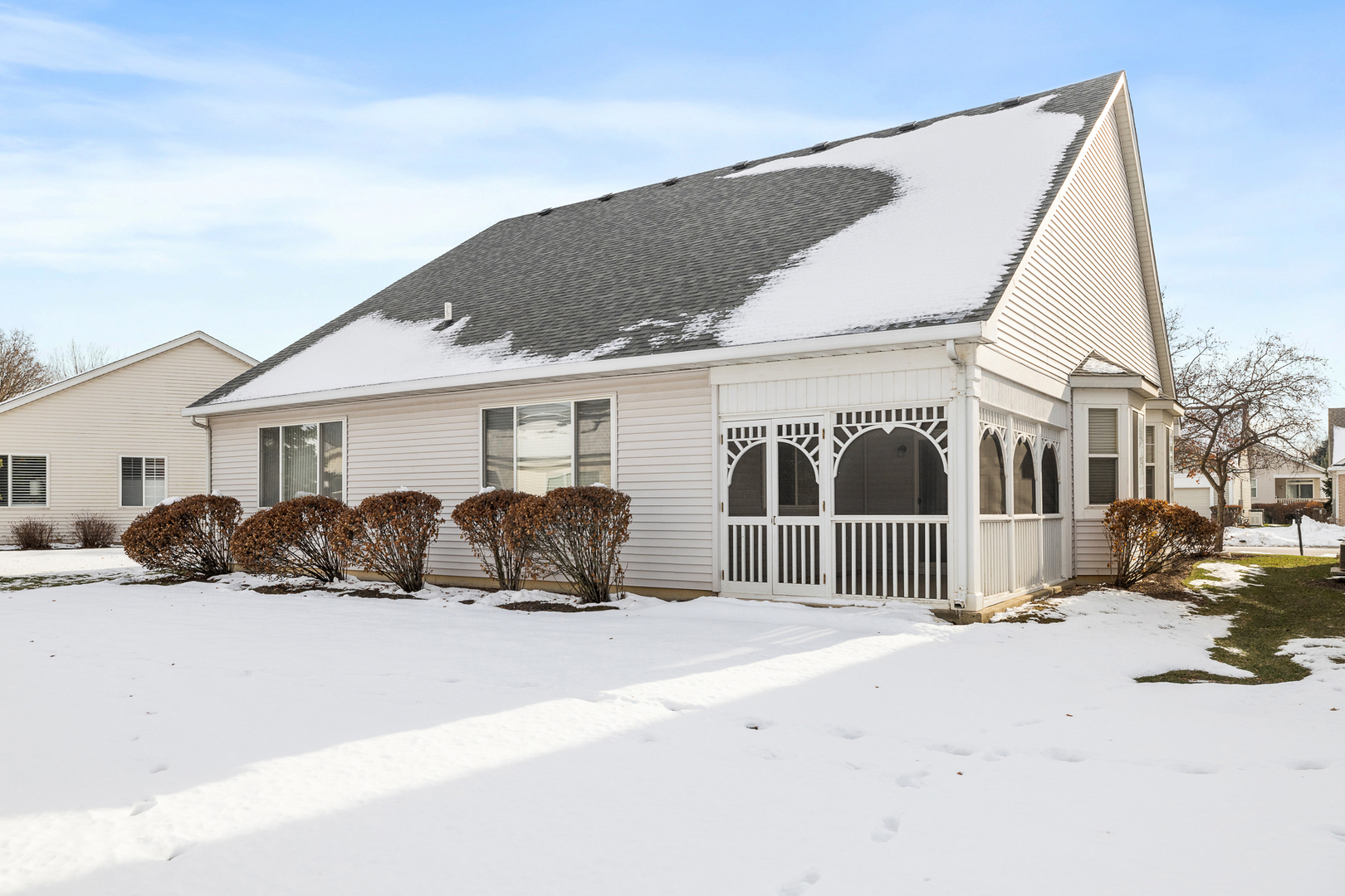 631 Saugatuk Circle Romeoville, IL 60446 - Photo 20 of 22 a view of a house with a yard covered in snow