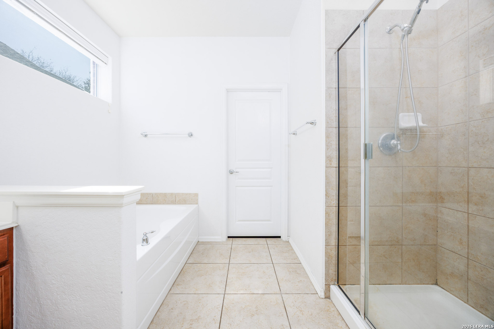 4702 Thomas Rusk San Antonio, TX 78253 - Photo 10 of 18 a bathroom with a bathtub and shower